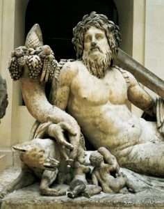 Marble statue representing Tiber River, Temple of Isis and Serapis. Detail, Cornucopia and Wolf nursing twins Romulus and Remus, From Rome